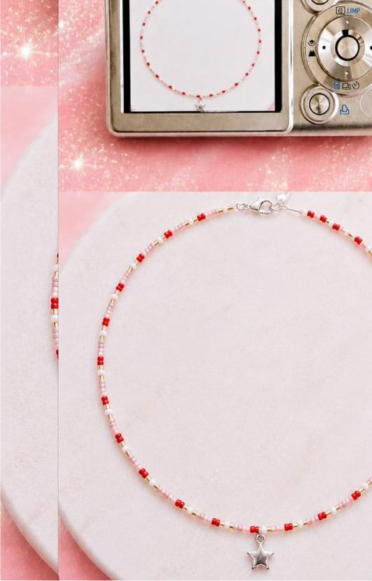 Esti — delicate seed-bead necklace in red, blush and gold with a silver star charm, photographed with a vintage compact camera